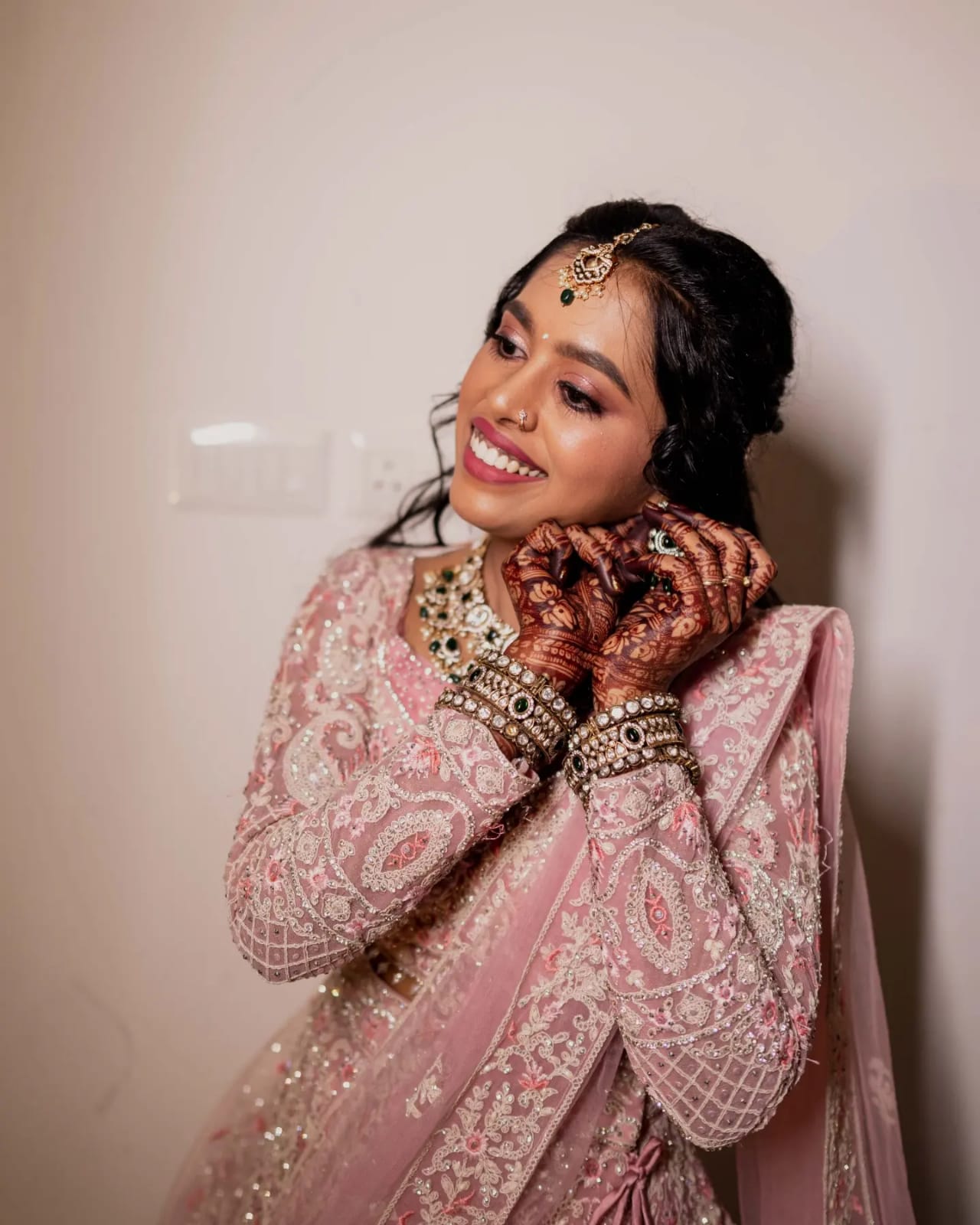 Soft glam detail in pink attire